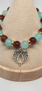 Bracelet L'Étreinte des Ailes - détail charm cœur ailé